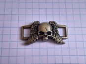 Декоративна вставка Череп з крилами