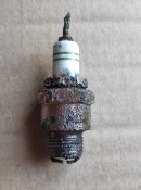 Свеча зажигания Бош .