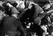 16439_Alpini della divisione Julia durante il rancio nella primavara 1941.jpg