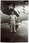 Airman Stands by Nose Art.JPG