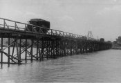 4_Ponte di legno su un fiume costruito per il passaggio di autocolonne nell'estate 1941.jpg