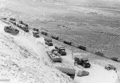 2_Lorry column with supply goods on the mountain road to Derna May 1941.jpg