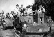 2_A group of Japanese soldiers advancing in the Johor region Malaysia, January 1942.jpg