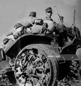 8_Finnish soldiers on a off-road trailer near Leningrad August 1941.jpg