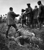 8. gebirgsjager052 Agonizing thirst makes Bolsheviks drink from each puddle.jpg