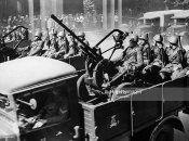 2_Italian soldiers with anti-aircraft gun in a military parade.jpg