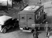 5_Carabinieri stopping and checking an ambulance on duty in Albania November 1940.jpg
