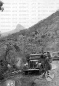 1_Autocarri della colonna Starace transitano lungo una pista Etiopia 04-1936.jpg