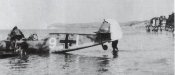 1-Bf-109E-7.JG53-(W9+I)-after-a-belly-landing-on-a-Beach-1940-01.jpg
