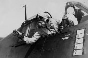 Lt_Cdr_Edward_Outlaw_waves_from_the_cockpit_of_his_F6F-3_Hellcat.jpg