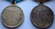 2 медали «В память войны 1853—1856» на колодке