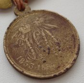 2 медали «В память войны 1853—1856» на колодке