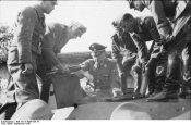 Himmler_with_WSS_officers_on_panzer_Metz_sep1940__Bild_101III-Weill-059-18.jpg