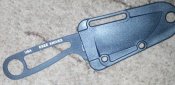 ESEE Izula черный, рукоять оранжевый паракорд с светоотражающей нитью.