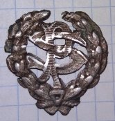 Польська посріблена шкільна кокарда 1909 р.