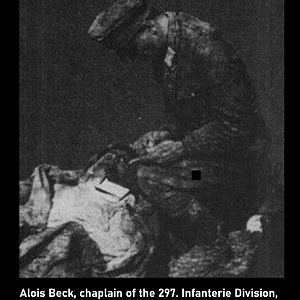 Alois Beck, chaplain of the 297. Infanterie Division, writing letters for the wounded.