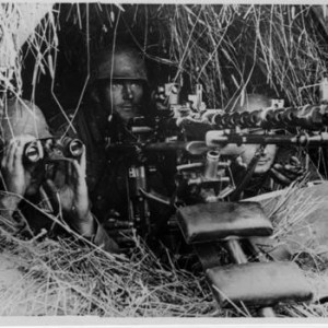 Hidden MG34 in hay bale Russia.jpeg